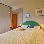 Апартаменты 2-bedroom Lakeview Bella Gaeta Сан-Сиро